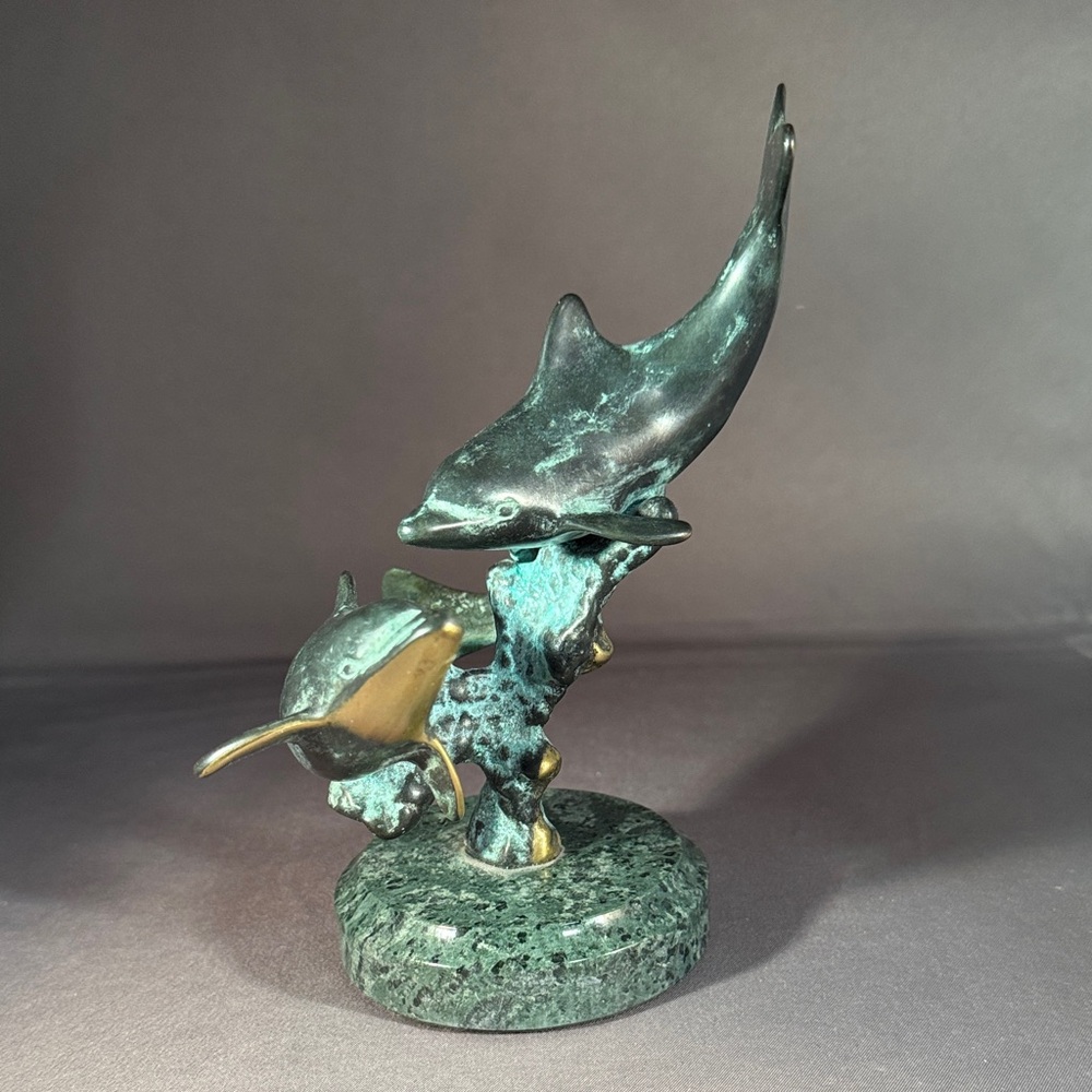 Artistic Dolphin Sculpture in Black and Green